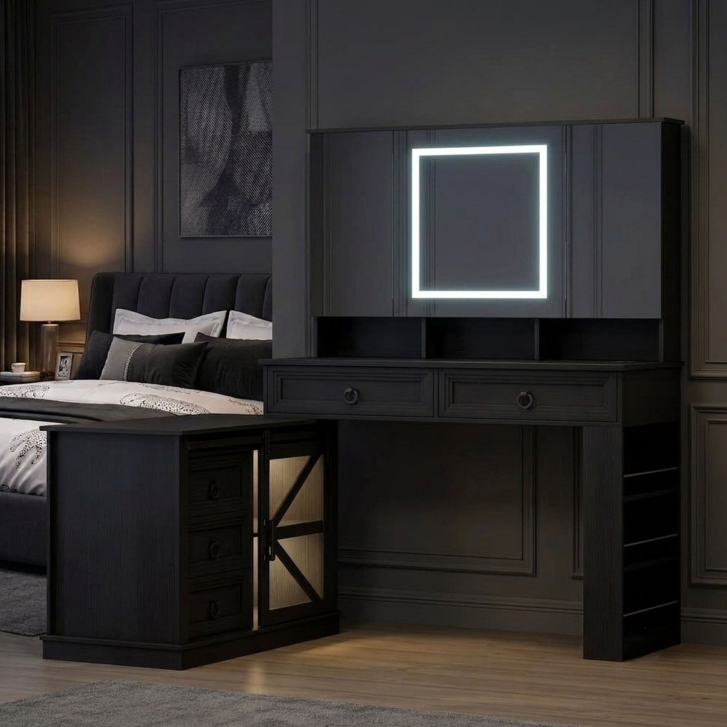 A dark wood vanity desk and cabinet set with an illuminated square mirror, shown in a styled bedroom interior next to a bed.