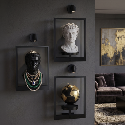 Decorative wall art with busts and a globe in a modern living room.