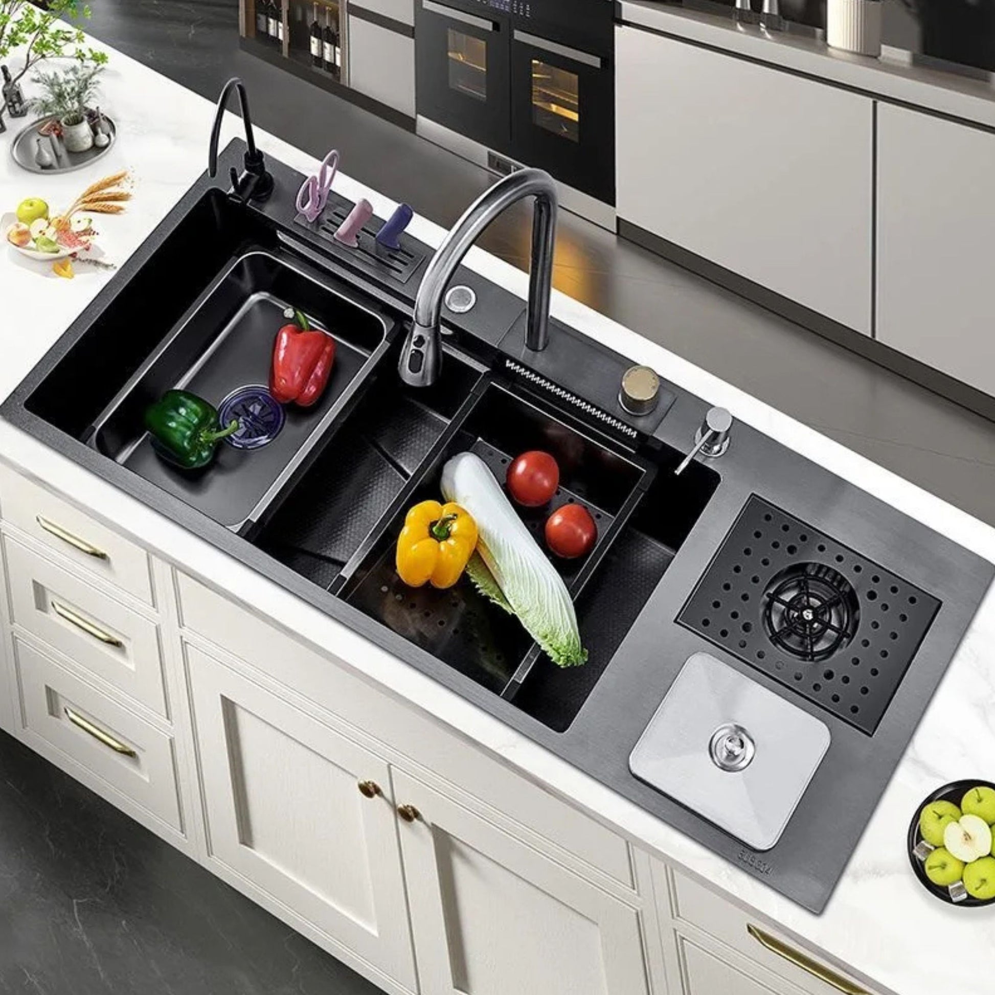 A modern black double-basin kitchen sink with an integrated drain, a square drain cover, and a vegetable tray organizer holding fresh vegetables, installed in a white and gray kitchen.