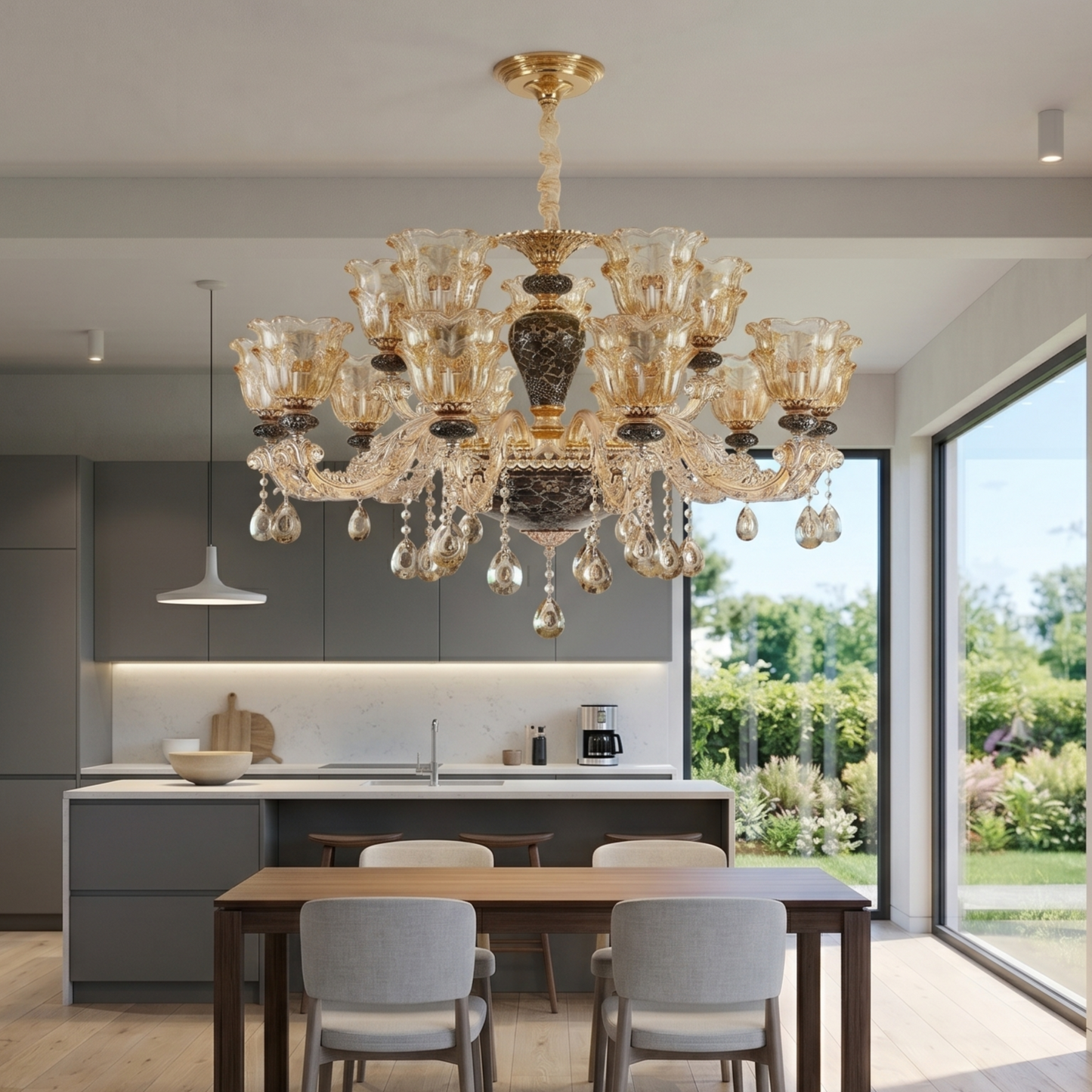 Luxurious chandelier hanging in a modern kitchen with a dining table and chairs.
