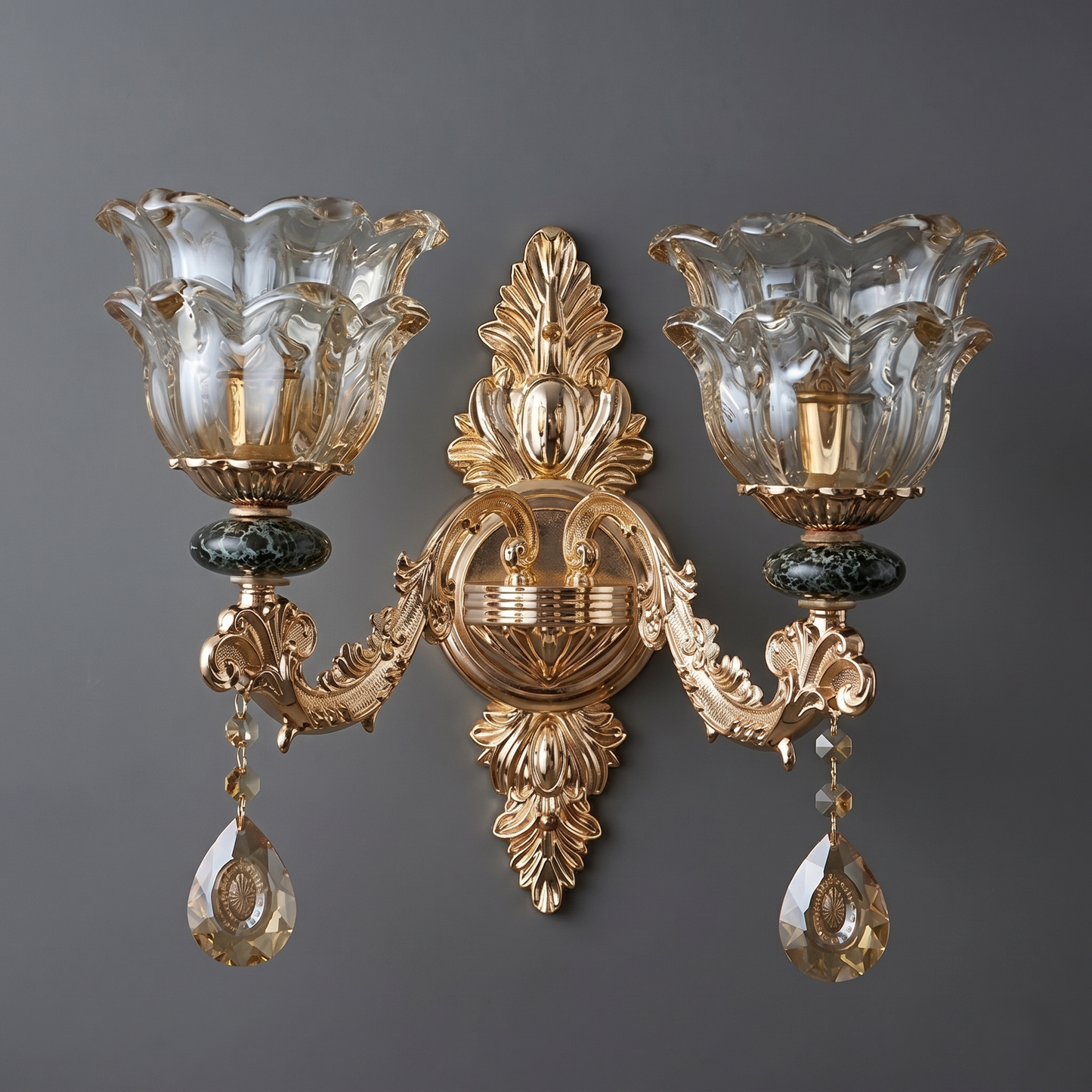 Decorative wall sconce with gold and crystal design on a gray background