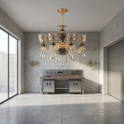 Modern kitchen with a chandelier and stainless steel appliances.